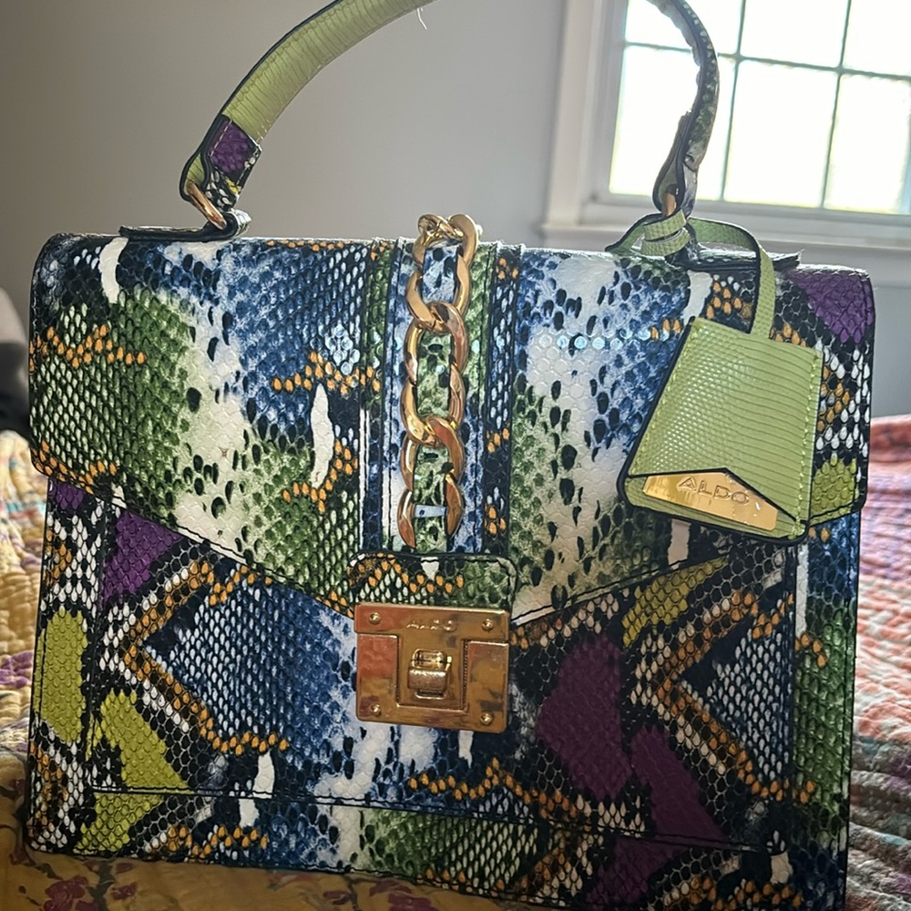 Also croc embossed colorful bag